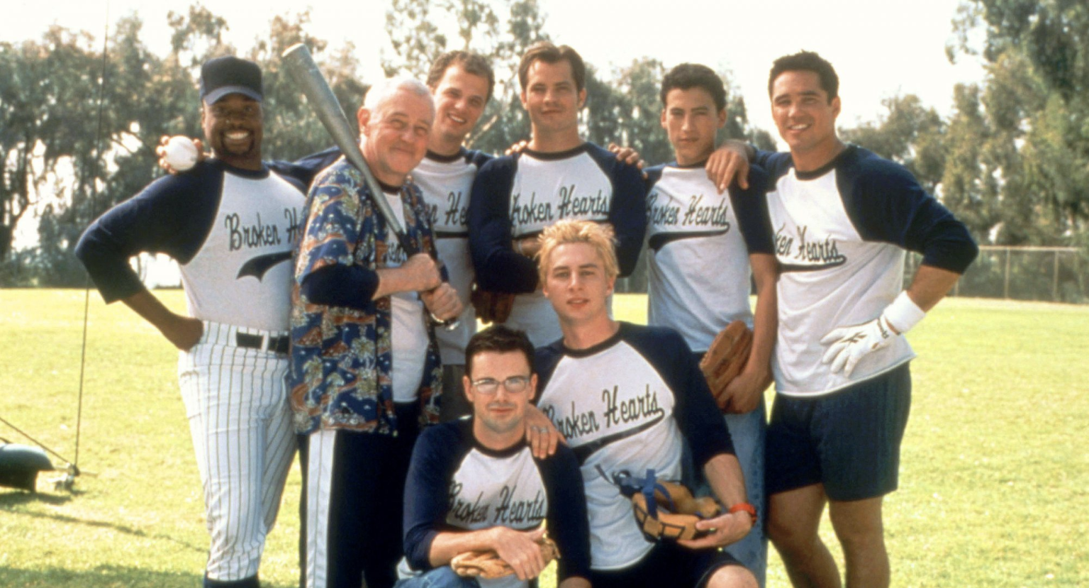 Softball team group photo wearing matching softball tee's with